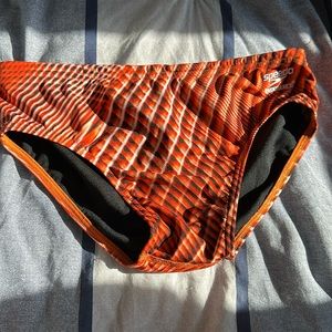 Used orange and black speedo endurance